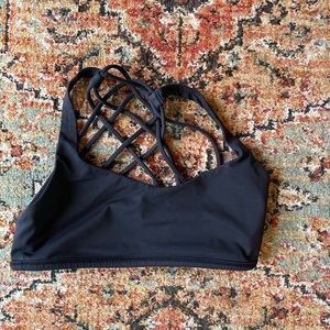Lululemon sports bra, size 6, free to be wild. Well loved but lots of life.